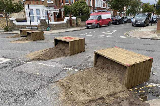 Upturned planters on Leighton Road