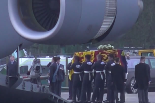 The Queen's coffin is taken off the plane at RAF Northolt