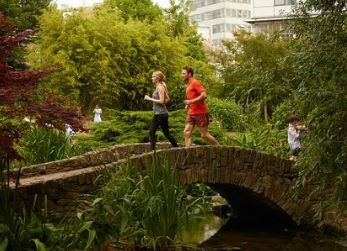 People enjoying Hammersmith Park in Shepherd's Bush