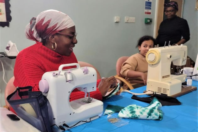 Gladys (left) and Ritaj (right) at their first sewing club session